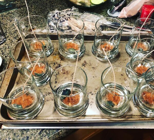 Large Mars candles, pre-pour. Each one features Mars powder and a bloodstone arrowhead Large Mars candles, pre-pour. Each one features Mars powder and a bloodstone arrowhead